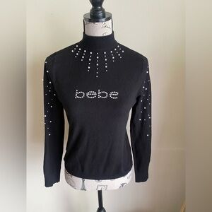 Bebe black logo faux pearl rhinestone embellished knit mock neck sweater